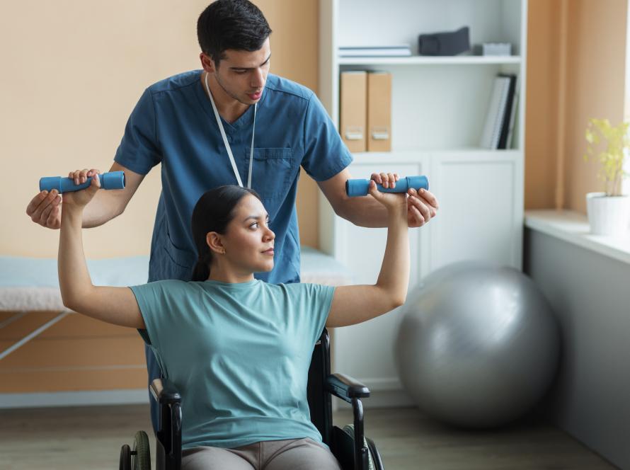 doctor-helping-patient-rehabilitation
